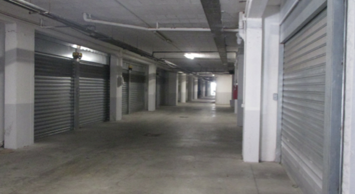 Il proprietario di un box auto deve pagare le spese condominiali?